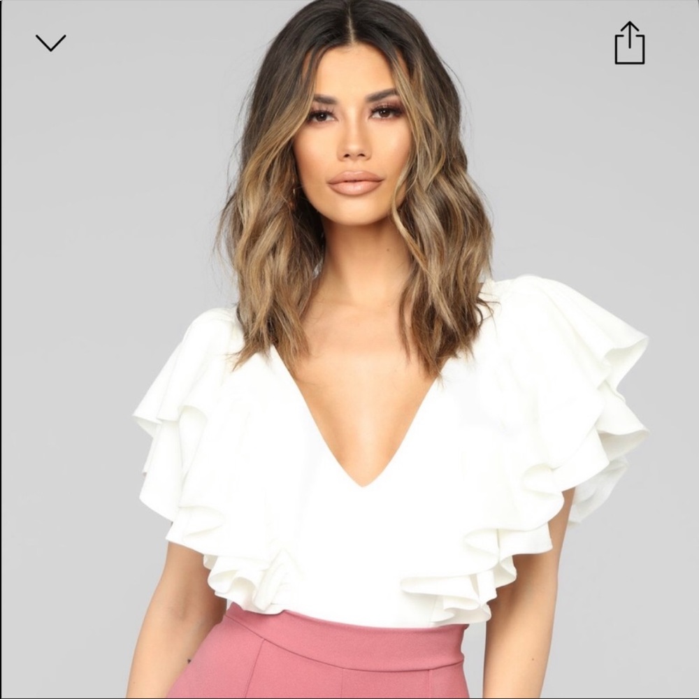 NWT - white ruffle body suit
